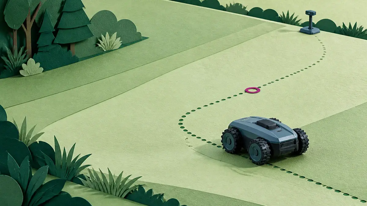 Firehjulstrukket robotplæneklipper på en skrånende græsplæne med stiplet GPS-rute og waypoint